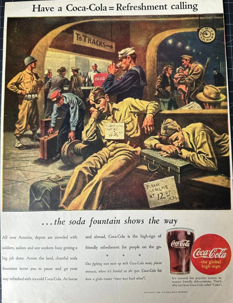 1944 Coke advertisement featuring soldiers waiting to deploy for war.