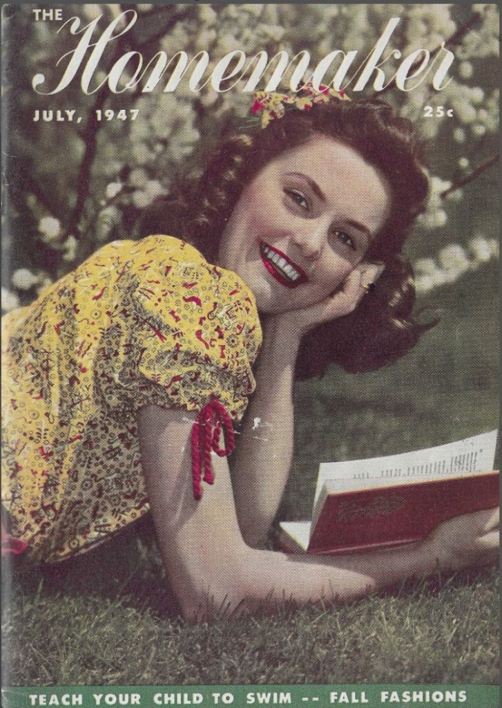 1940s vintage magazine-HOMEMAKER July 1947 featuring a woman on the cover with a 1940s hairstyle and a hair flower in her hair. 