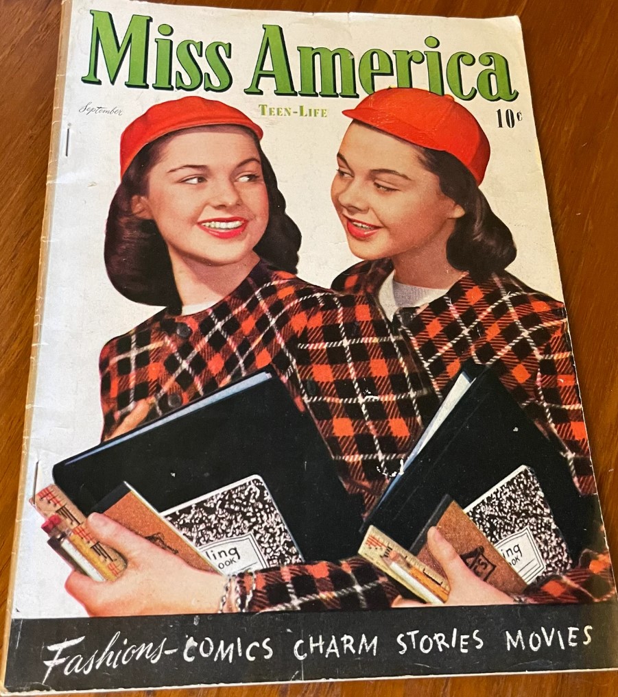 1940s vintage magazine cover for 'Miss America' teenager magazine from 1945 featuring tow girls in plaid fashions. 