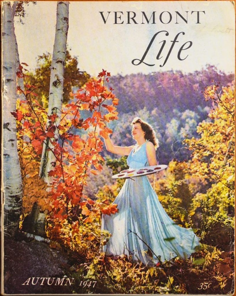 1940s vintage magazine for Vermont Life Autumn 1947 featuring a woman in a gown posing with a paint pallet in a forest of fall trees