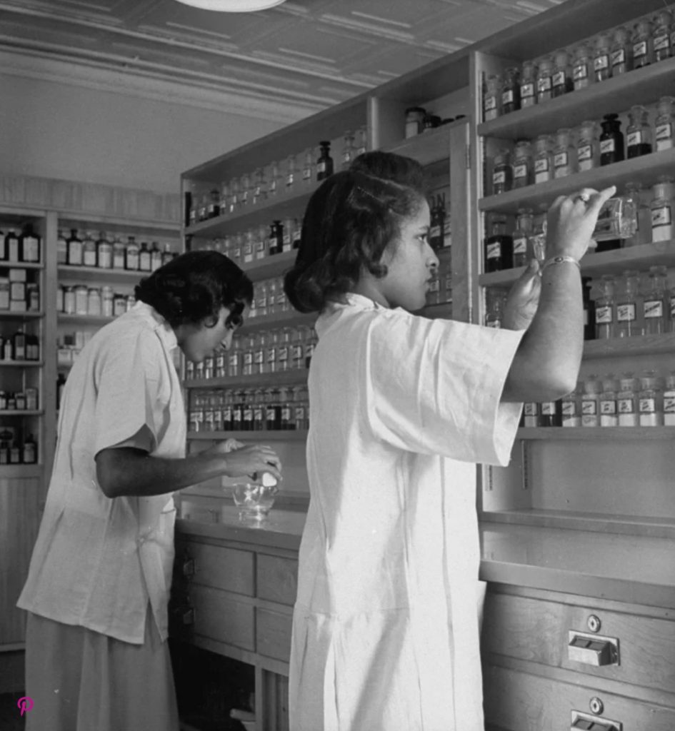 1940s Vintage Photo: Two Black female students filling prescriptions in School of Pharmacy at Howard University in Washington D.C in 1946.