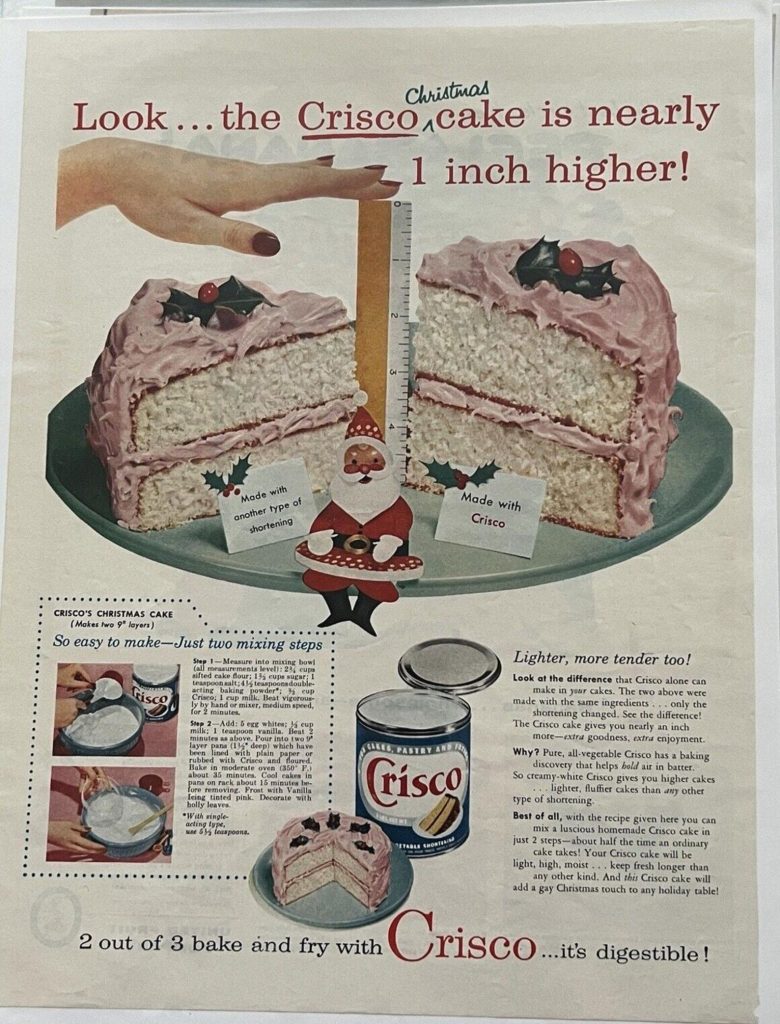 1950s vintage Christmas Cake advertisement for Crisco featuring a Pink frosting Christmas Cake baking recipe.