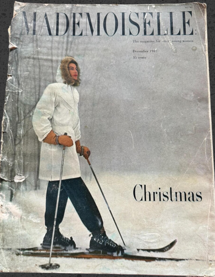 1940s Vintage Magazine: Mademoiselle Christmas December 1947 featuring a woman in a ski outfit and skis on the cover. 