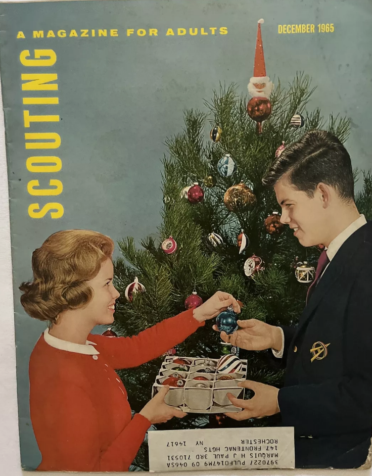 1960s Vintage Christmas Magazine-SCOUTING December 1965 featuring two young adults decorating a Christmas Tree. 