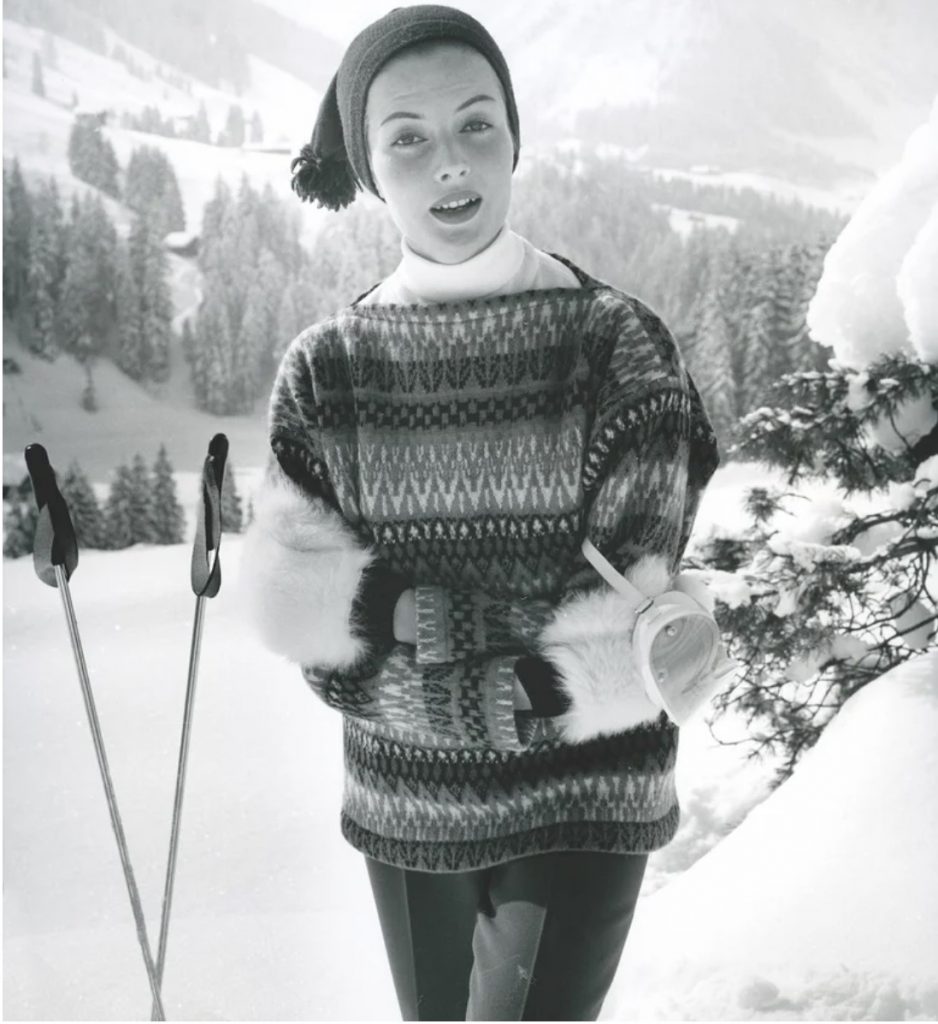 1958-1959 photo of a model wearing a Bogner sweater. Bogner skiwear is the epitome of timeless.