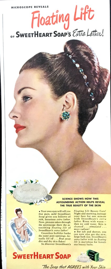 1950s vintage advertisement for SweetHeart Soap featuring a 1950s woman in a 1950s hairstyle. 