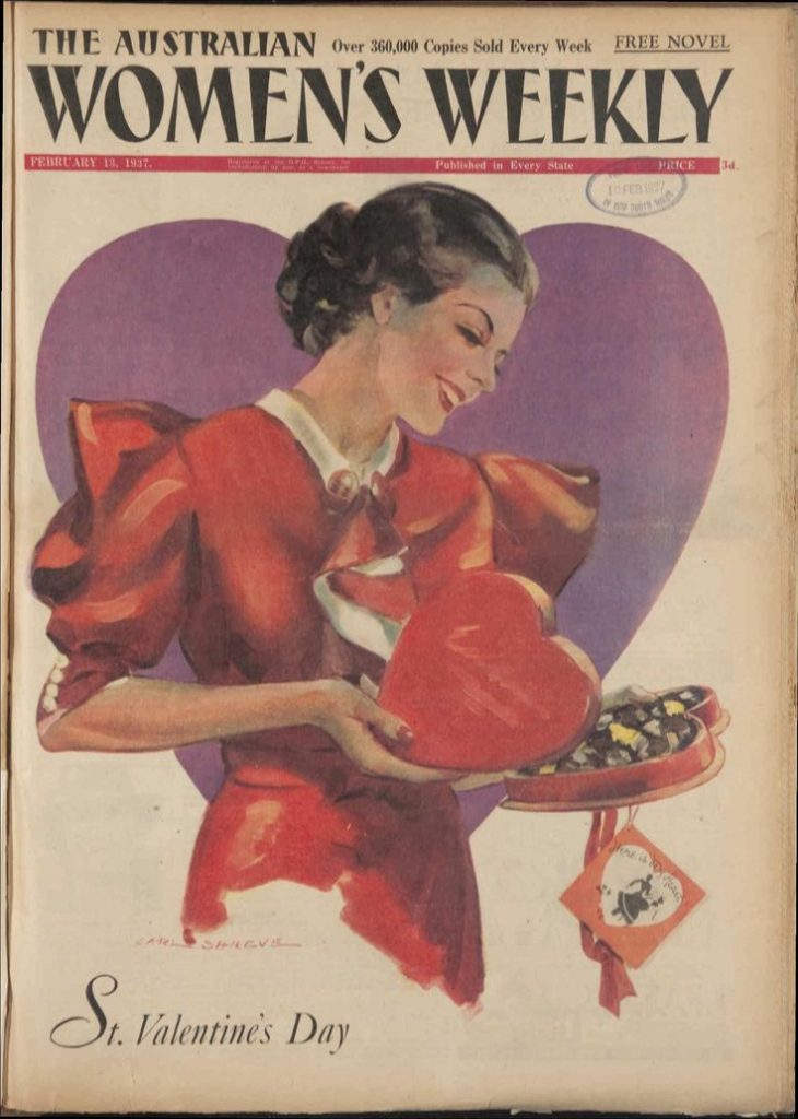 1930s vintage magazine cover-St. Valentine's Day edition from Australian Women's Weekly February 1937 featuring an illustration of a 1930s woman in a 1930s dress opening a heart shaped box of chocolates. 